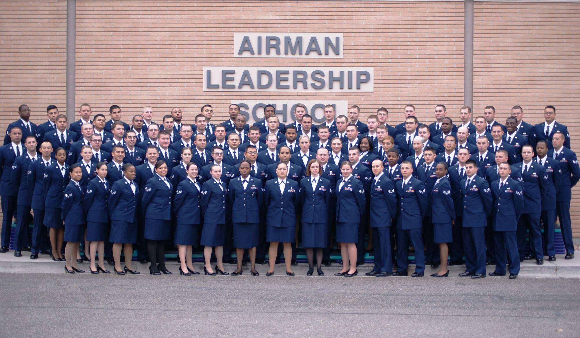 Members of Airman Leadership School Class 15-A pose for a class photo prior to their graduation ceremony at Nellis Air Force Base, Nev., Dec. 18, 2014. Ninety-six Airmen completed their first professional military education milestone by graduating this course. (U.S. Air Force courtesy photo)