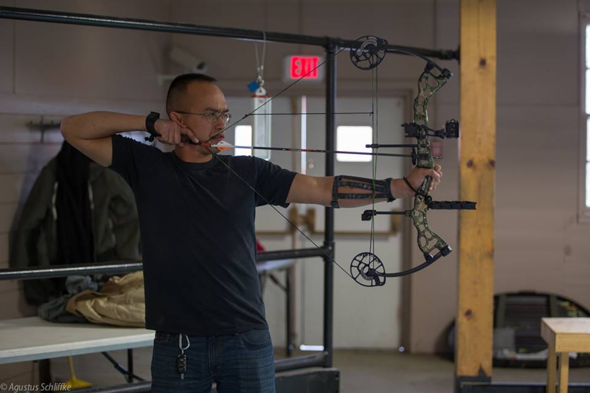 An indoor archery range is one of the many tactivities available to Airmen on base. For an annual fee, individuals receive safety training and access to equipment to practice at any time during the day. (Courtesy photo/Agustus Schliffke)
