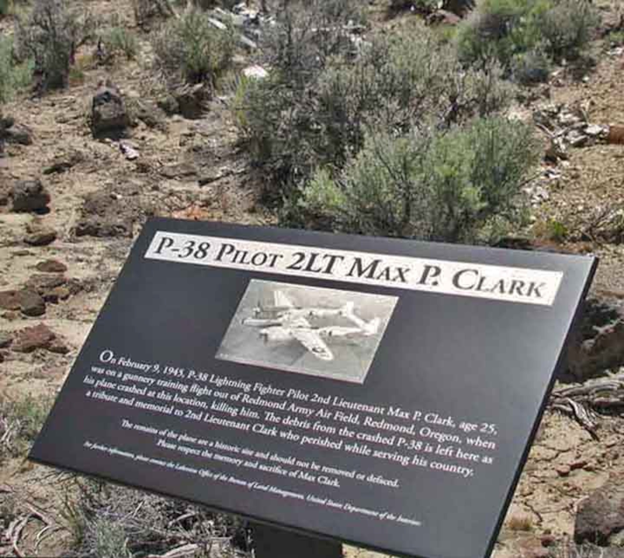 Memorial Plaque at crash site of 2nd Lt. Max P. Clark, U.S. Army Air Corps, a P-38 Lightning student pilot lost during a gunnery training mission flown from Redmond Army Air Base in February 1945.  (Courtesy Ginger Sanders, Photograph Oregon Web Log)