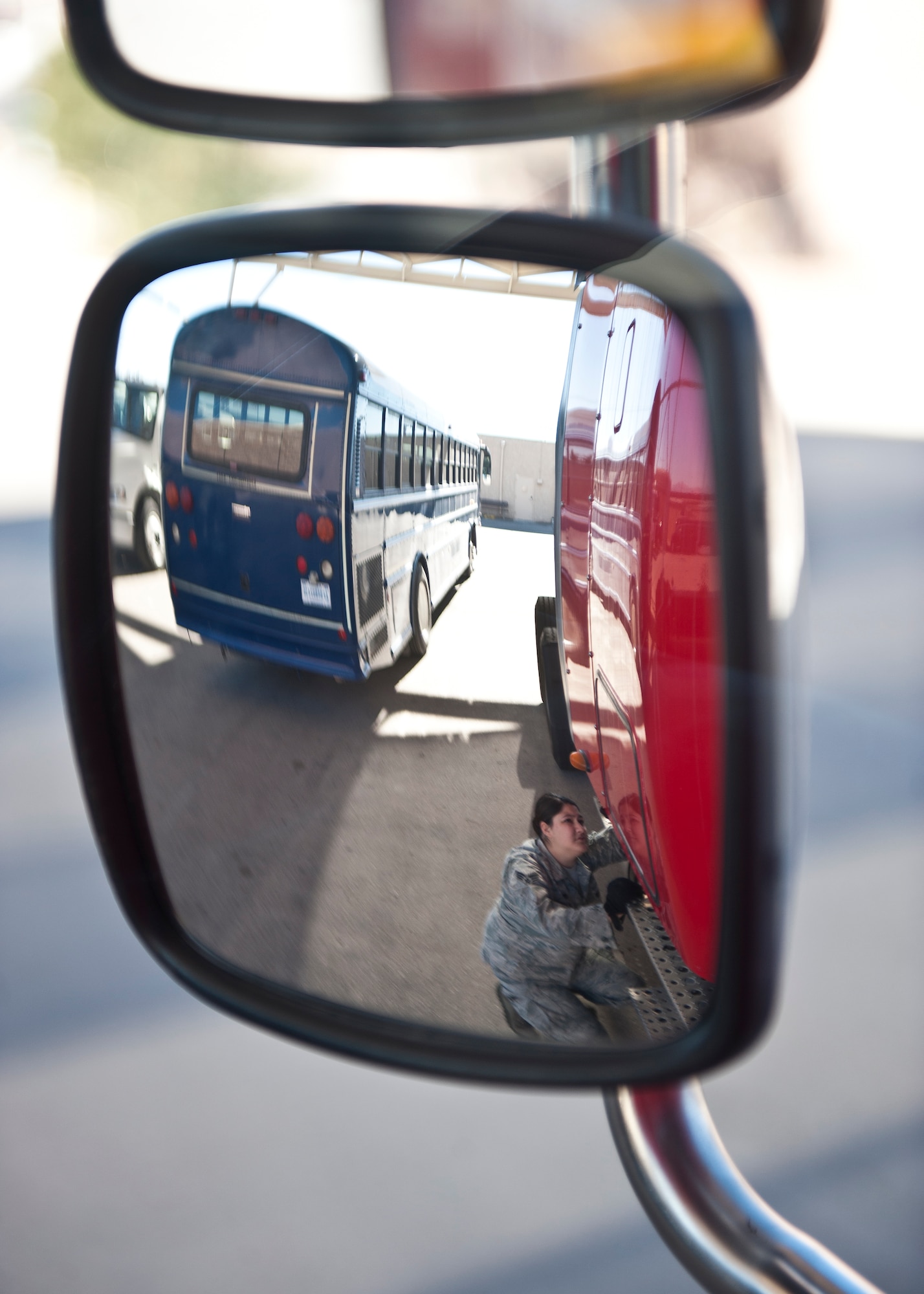 Senior Airman Megan Rasor, 99th Logistics Readiness Squadron vehicle operator, performs a monthly maintenance check on a semi-truck at the vehicle operations center on Nellis Air Force Base, Nev., Jan. 6, 2015. The maintenance checks are performed monthly and have to take place within the first 10 days of the month. (U.S. Air Force photo by Airman 1st Class Mikaley Towle)