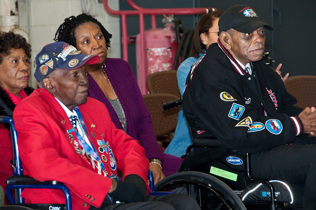 Original Tuskegee Airmen Dr. Calvin Spann, P-51 pilot (left), and Homer Hogues, airplane mechanic for Gen. Chappie James, gets a tour of the B-52H Stratofortress at Barksdale Air Force Base, La., Dec. 27, 2015. The Tuskegee Airmen were in town to receive the Omar N. Bradley "Spirit of Independence" Award during the halftime of the Duck Commander Independence Bowl.  (U.S. Air Force photo by Master Sgt. Mary Hinson/Released)