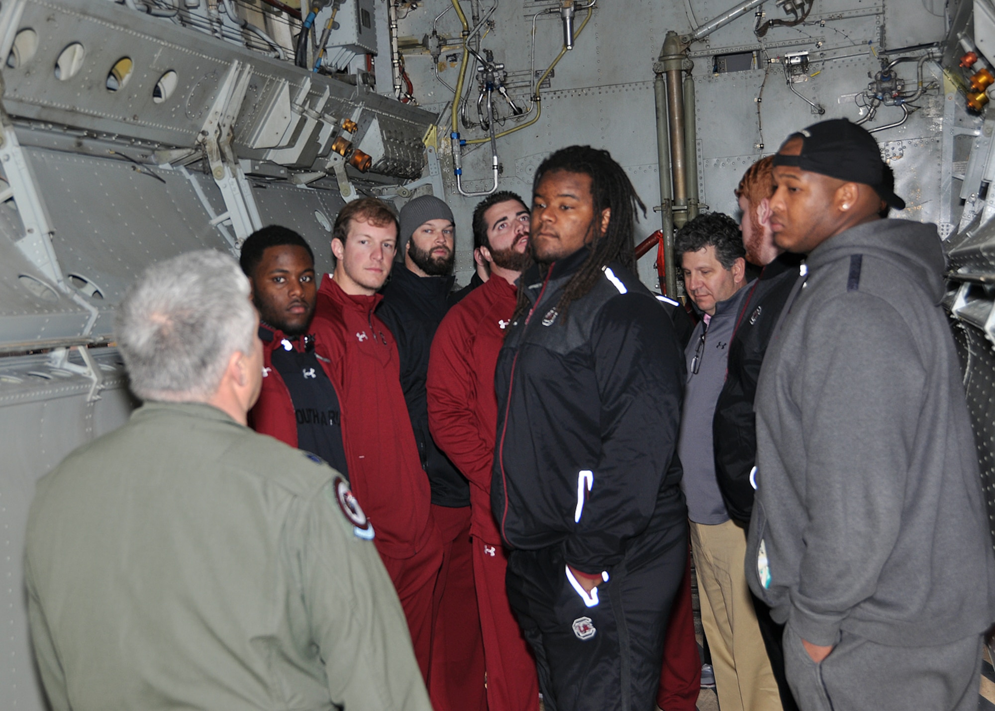 Members of the University of South Carolina football team get a tour of the B-52H Stratofortress from U.S. Air Force Lt. Col. Kurt McClure, 93rd Bomb Squadron , Dec. 26, 2014, at Barksdale Air Force Base, La. The team was in Shreveport, La.,  to play in the Duck Commander Independence Bowl at Independence Stadium against the University of Miami. (U.S. Air Force photo by Master Sgt. Mary Hinson/Released)