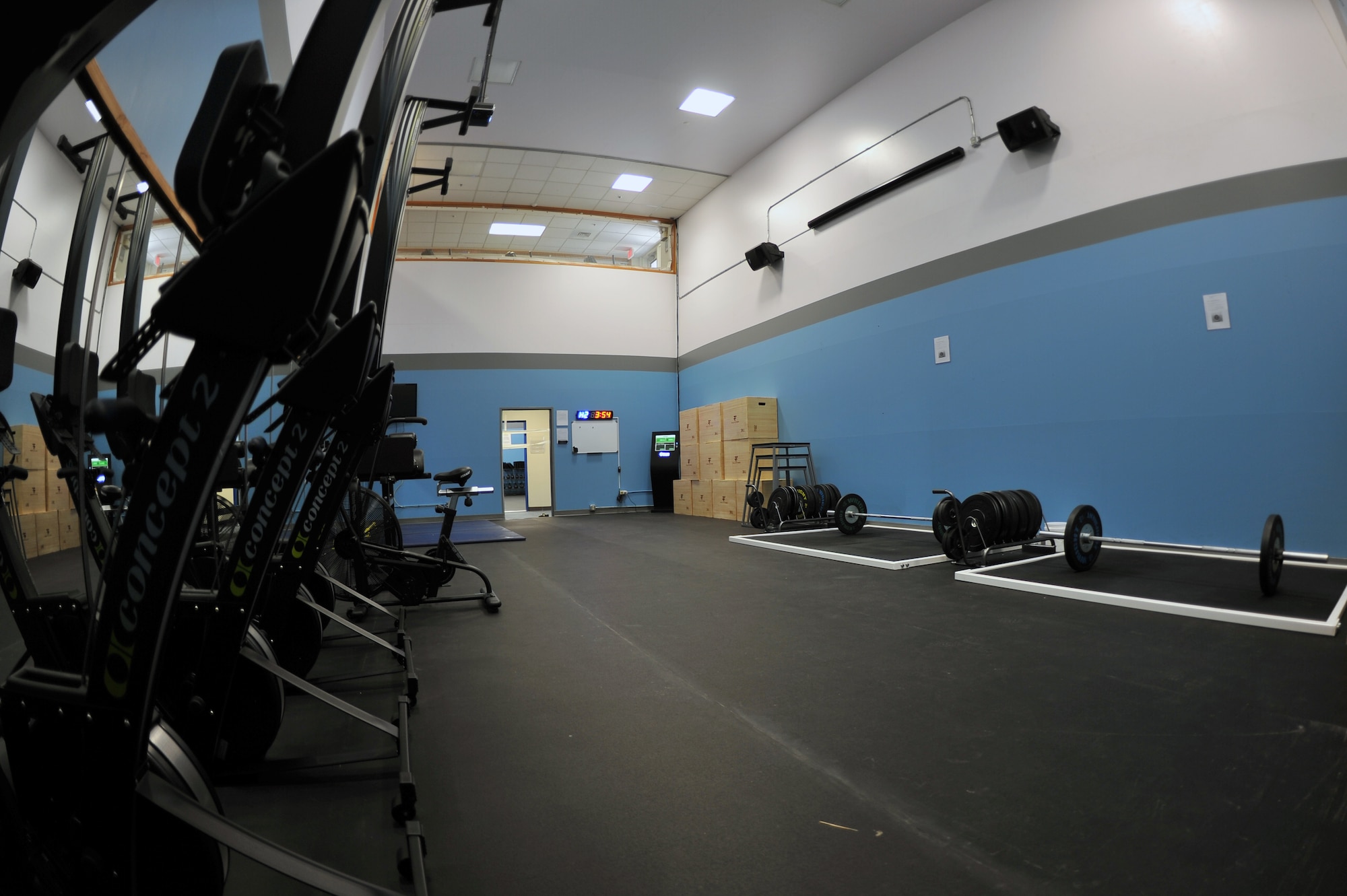 ALTUS AIR FORCE BASE, Okla. – The second of two rooms that house new equipment waits for its first patron inside the fitness center Jan. 7, 2014. The equipment in the newly added Functional Fitness Center includes two Olympic weightlifting platforms, five rowers, a 30 foot pull-up rig, 20 barbells, more than 2,500 lbs in rubber plates, kettlebells and wall balls. Altus AFB will open the new Functional Fitness Center beginning Jan. 8, 2014. The Functional Fitness Center is one of several projects funded by the $700,000 awarded to Altus AFB for winning the 2014 Commander-in-Chief’s Installation Excellence Award. (U.S. Air Force photo by Senior Airman Dillon Davis/Released)