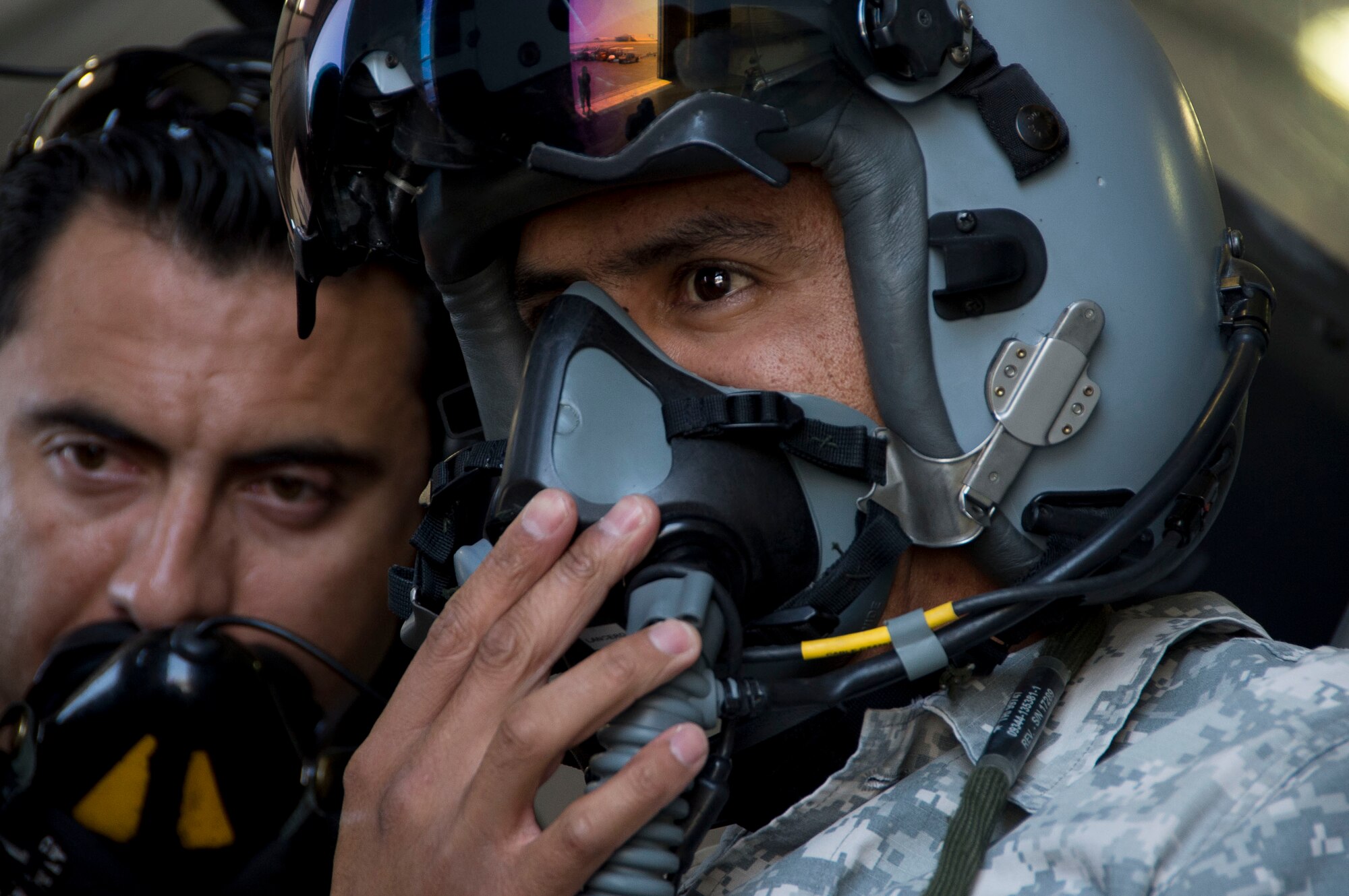 Members of the Fuerza Aérea de Chile (Chilean air force) perform preflight functions checks on Dec. 03, 2014, in Chile. Members of Air Forces Southern embarked on a four week journey, which corresponded with United States Southern Command’s priorities of building partner capacity through sustained engagement and provided AFSOUTH Airmen with firsthand experience at assisting in building partner capacity. (U.S. Air Force photo by Staff Sgt. Adam Grant/Released)