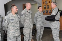 Gen. Mark Welsh (right), Air Force chief of staff, meets with several defenders from the 902nd Security Forces Squadron Dec. 9 while at Joint Base San Antonio-Randolph. From left are Tech. Sgt. Jesus Gonzales, 902nd SFS kennel master; Staff Sgt. Clinton Patton and his military working dog, Vudu; and Airman 1st Class Victoria Dunning. Other defenders who met with Welsh, not pictured were: Master Sgt. Ehlmer Smith, 902nd SFS NCO in charge of operations; Master Sgt. Kerry Carr, 902nd SFS first sergeant and Master Sgt. Samuel Figueroa, 902nd SFS operations superintendent. (U.S. Air Force photo by Melissa Peterson)