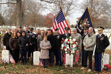 Veterans from the New York Army National Guard's Task Force Wolfhound join the Urbina family at Long Island National Cemetery in Farmingdale, New York, to mark the tenth anniversary of Spc. Wilfredo Urbina's loss in combat on Nov. 29, 2004 while deployed with the 1st Battalion, 69th Infantry to Iraq. The 69th Regimental family also remembered Sgt. Christian Engeldrum in a wreath-laying ceremony Nov. 29, 2014, at Engeldrum Bluff at Fort Hamilton, New York, and at Arlington National Cemetery in Virginia. 