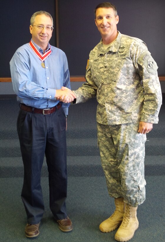 Greg Estep, chief of Hydrology and Hydraulics, Tulsa District, U.S. Army Corps of Engineers was presented with a de Fleury medal by Tulsa District Commander, Col. Richard A. Pratt. Estep began his career with the Corps of Engineers at the Fort Worth District in 1981.