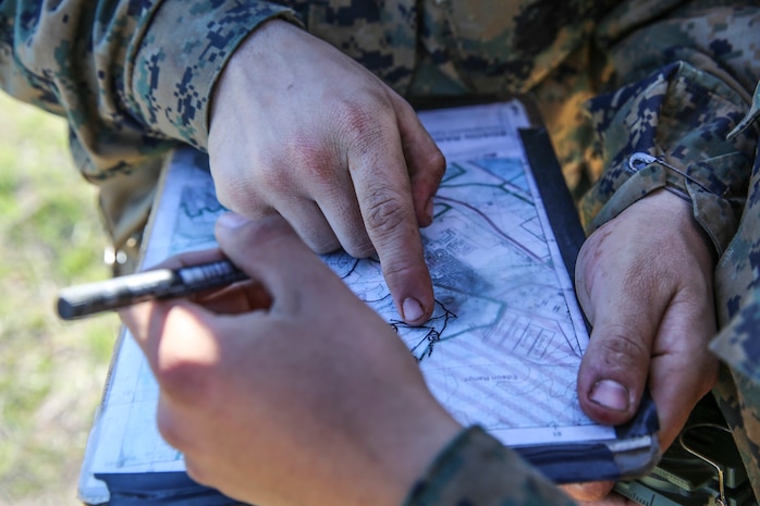 Recruits of Bravo Company, 1st Recruit Training Battalion, find their way to their next point during the Land Navigation Course at Edson Range, Marine Corps Base Camp Pendleton, Jan. 6. Recruits will be able to utilize their land navigation skills again once they are Marines after they graduate recruit training when they move onto the School of Infantry