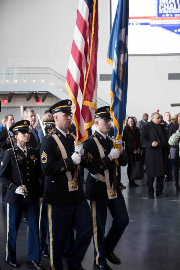 An Army color guard marches moments on the colors before a press conference at the National World War II Museum in New Orleans, Jan. 7, 2015. The press conference, led by New Orleans Mayor Mitch Landrieu, announced the official accomplishment of First Lady Michelle Obama’s nationwide initiative, the Mayor’s Challenge to End Veteran Homelessness. (U.S. Marine Corps photo by Lance Cpl. Ian Ferro)