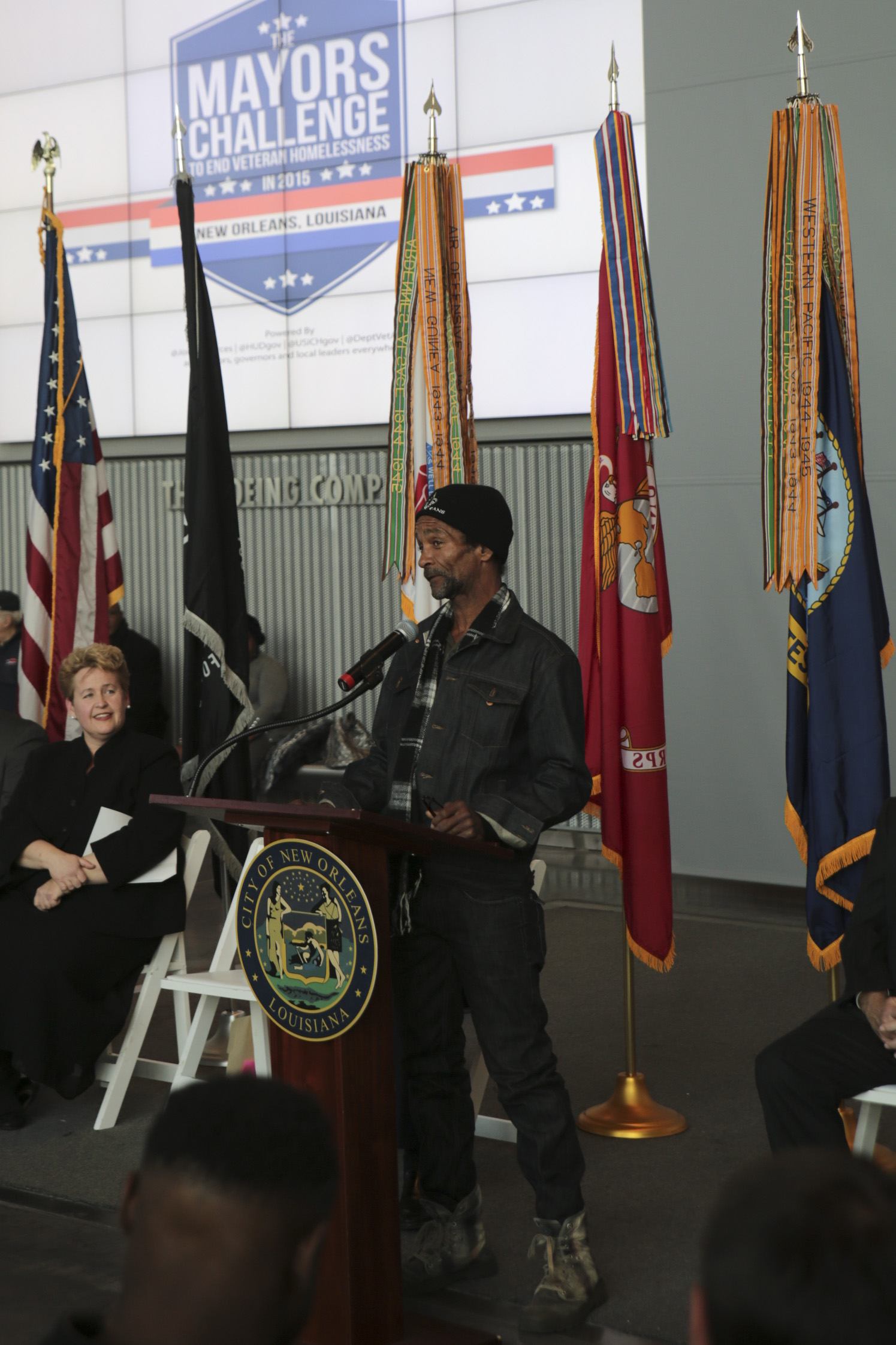 Michael Washington, a former homeless veteran, addresses attendees at the Mayor’s Challenge to End Veteran Homelessness press conference at the National World War II Museum in New Orleans, Jan. 7, 2015. Washington was the last homeless veteran to be housed in New Orleans, officially accomplishing the campaign’s objective in 2014. (U.S. Marine Corps photo by Lance Cpl. Ian Ferro)