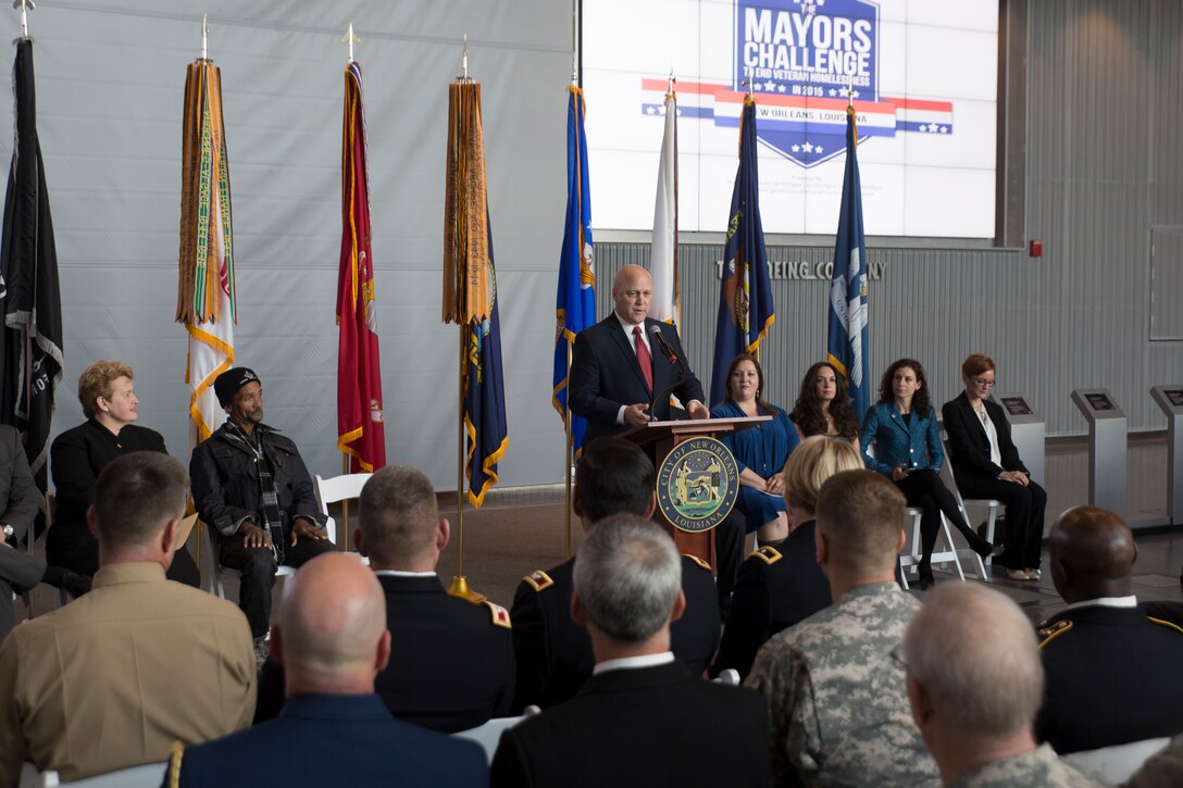 New Orleans Mayor Mitch Landrieu speaks to service members and civilians attending the Mayor’s Challenge to End Veteran Homelessness press conference at the National World War II Museum in New Orleans, Jan. 7, 2015.  New Orleans has effectively ended veteran homelessness by housing approximately 277 veterans in 2014 and ensuring that all veterans who become homeless will be housed within an average of 30 days. (U.S. Marine Corps photo by Lance Cpl. Ian Ferro)