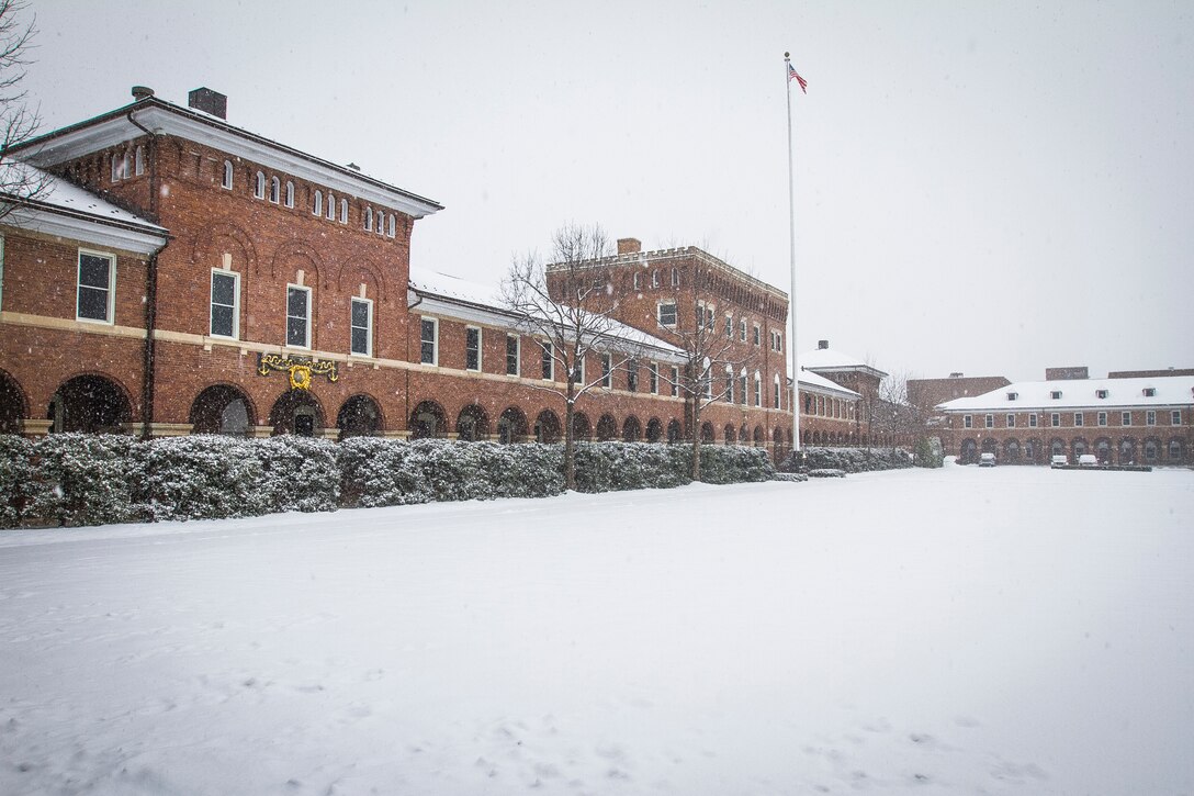 Snow falls at Marine Barracks, Washington, D.C., on Jan. 6, 2015. This marks the first snow of the new year in the area. (U.S. Marine Corps photo by Staff Sgt. Mallory S. VanderSchans/Released)
