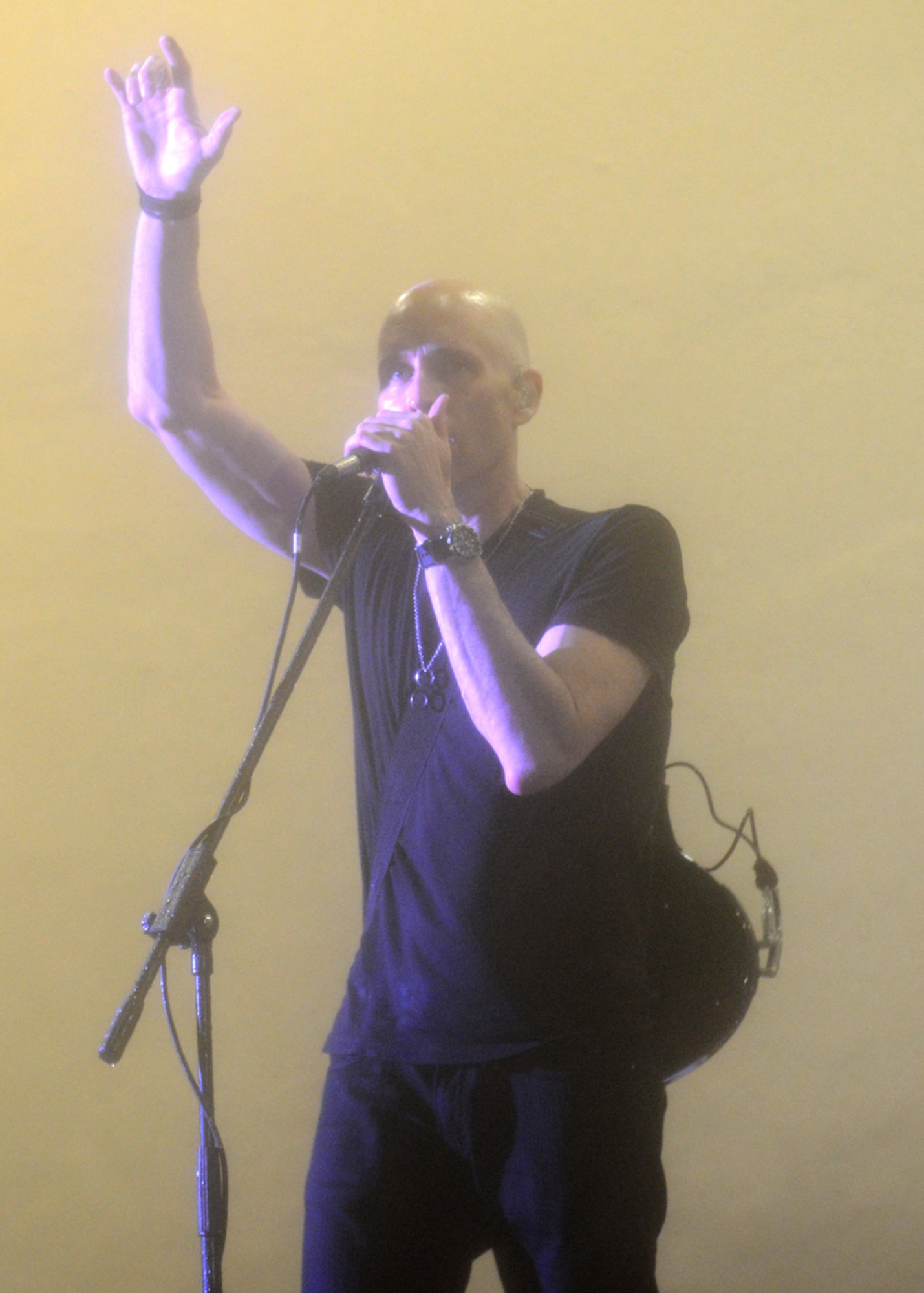 Alternative rock band Vertical Horizon lead singer and band co-founder Matthew Scannell thanks audience members for their patience and dedication for staying through a storm in the middle of the band’s hour-long set Jan. 6, 2015, at the Arc Light Amphitheater at Andersen Air Force Base, Guam. Vertical Horizon, participating in the Armed Forces Entertainment tour of several Pacific military installations, played through wind and rain for Team Andersen members and their families (U.S. Air Force photo by Tech. Sgt. Zachary Wilson/Released.) 