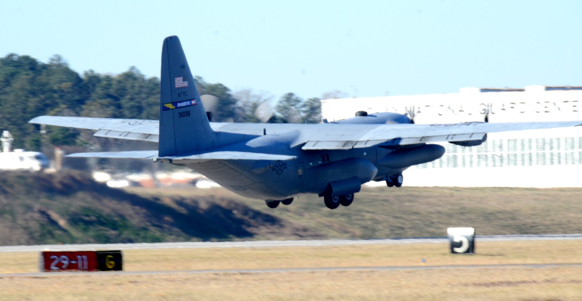 A U.S. Air Force C-130 Hercules takes off from Dobbins Air Reserve Base, Ga. for a deployment Jan. 8, 2015. More than 150 members from the 94th Airlift Wing deployed to support the Central Command Area of Responsibility. (U.S. Air Force photo/Brad Fallin)