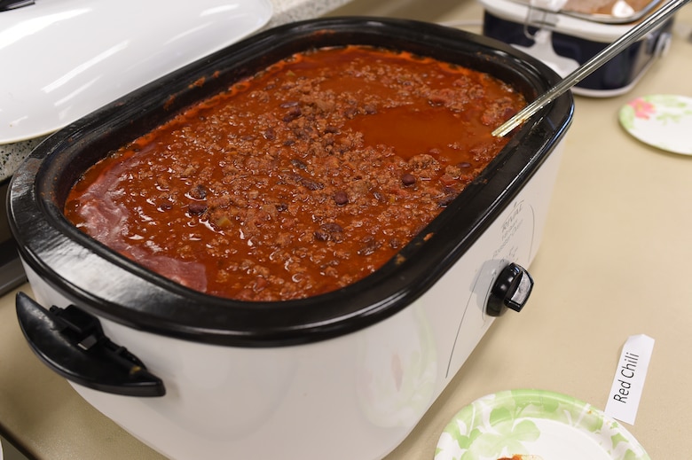 A crockpot filled with a red chili is one of 13 chilies entered into the chili cook-off held at the Buckley Chapel Jan. 7, 2015, on Buckley Air Force Base, Colo. Categories for judging included red, green, white, vegetarian, hot and overall chili, with each winner receiving a $20 gift card. (U.S. Air Force photo by Airman 1st Class Samantha Saulsbury/Released)