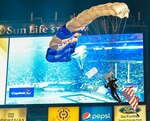 A U.S. Air Force Academy Wings of Blue demonstration team cadet drops into the Orange Bowl Dec. 31, 2014, at Sun Life Stadium in Miami. The Wings of Blue parachute teams were busy training, competing and taking part in a variety
of parachute demonstrations across the country during the holiday season. (Courtesy photo)