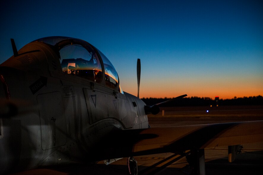 An A-29 Super Tucano assigned to the 81st Fighter Squadron sits on the flightline during a preflight inspection Jan. 8, 2015, at Moody Air Force Base, Ga. At the completion of Moody’s Afghan pilot and maintenance training mission, the aircraft is set to provide an air-to-ground capability to the Afghan Air Force. (U.S. Air Force photo by Senior Airman Ryan Callaghan/Released)