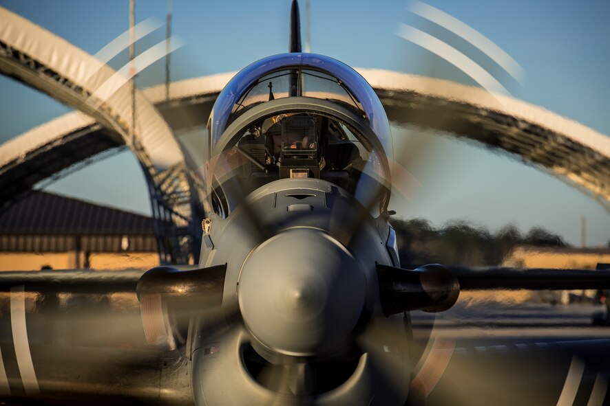 An 81st Fighter Squadron pilot starts the engine in an A-29 Super Tucano Jan. 8, 2015, at Moody Air Force Base, Ga. The A-29 is a turboprop aircraft designed for light air support (LAS) and will be used to support the Afghan LAS training mission at Moody. (U.S. Air Force photo by Senior Airman Ryan Callaghan/Released)