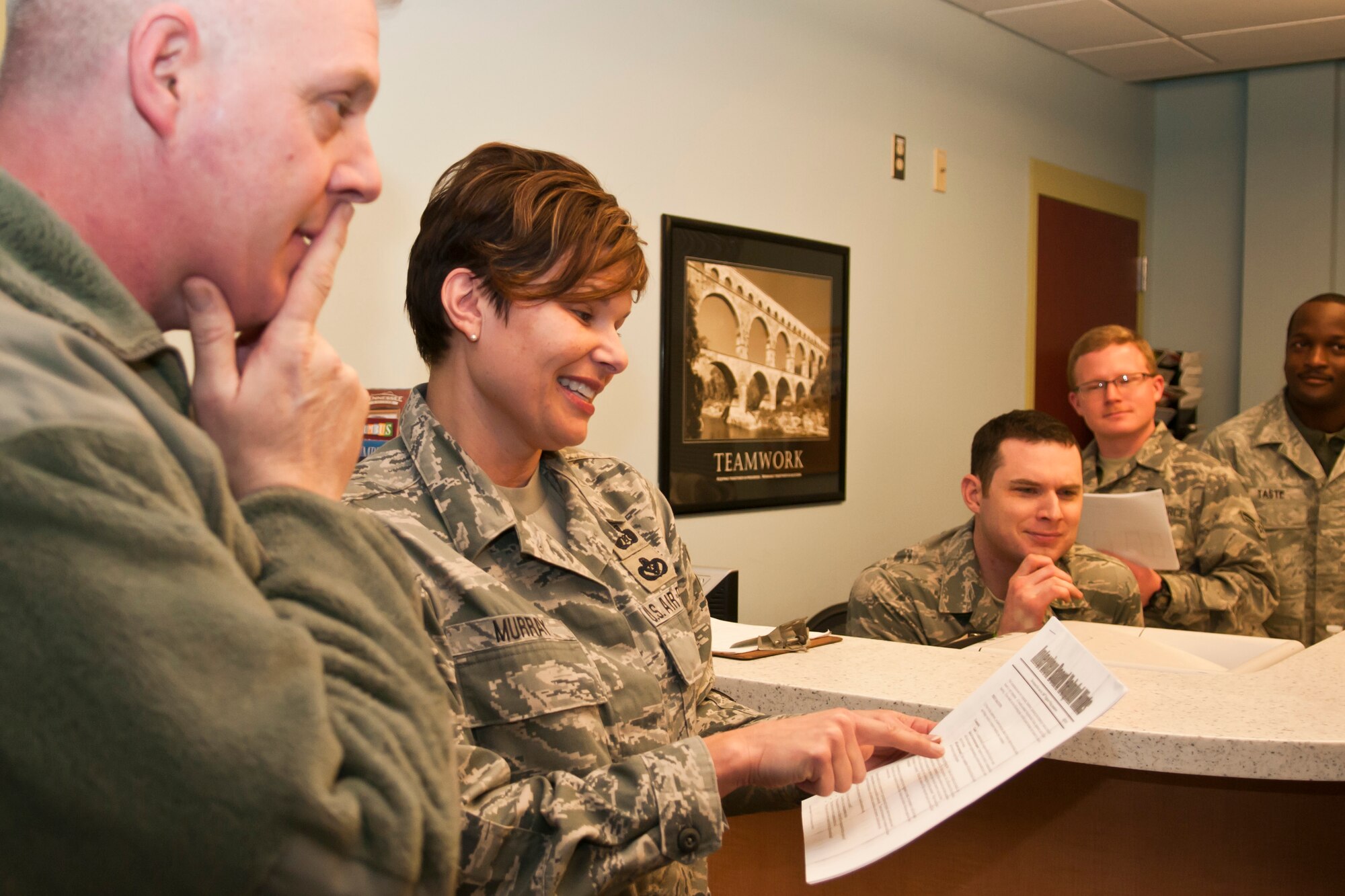 U.S. Air Force Senior Master Sgt. Julie Murray speaks with Airmen, Rickenbacker Air National Guard Base, Ohio, Dec. 13, 2014. (U.S. Air National Guard photo by Airman 1st Class Wendy Kuhn/Released)