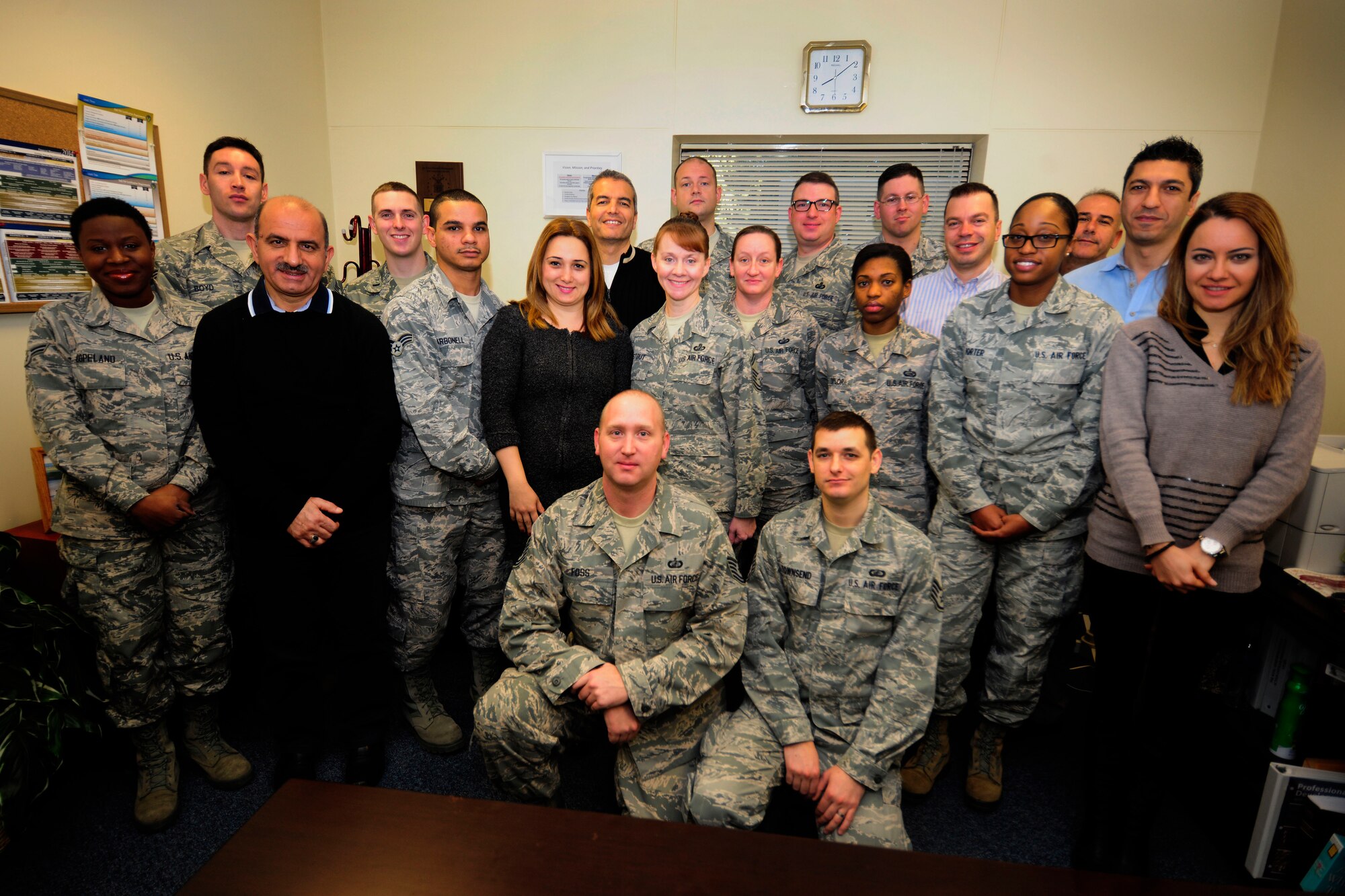 Senior Master Sgt. Angela Stout, 39th Comptroller Squadron superintendent, stands in the middle of a group of 39th CPTS Airmen Dec. 16, 2014, Incirlik Air Base, Turkey. Stout won the Chief Master Sgt. Larry P. Gonzales Superintendent of the Year award in the U.S. Air Forces in Europe - Air Forces Africa Financial Management annual awards. (U.S. Air Force photo by Senior Airman Krystal Ardrey/Released)