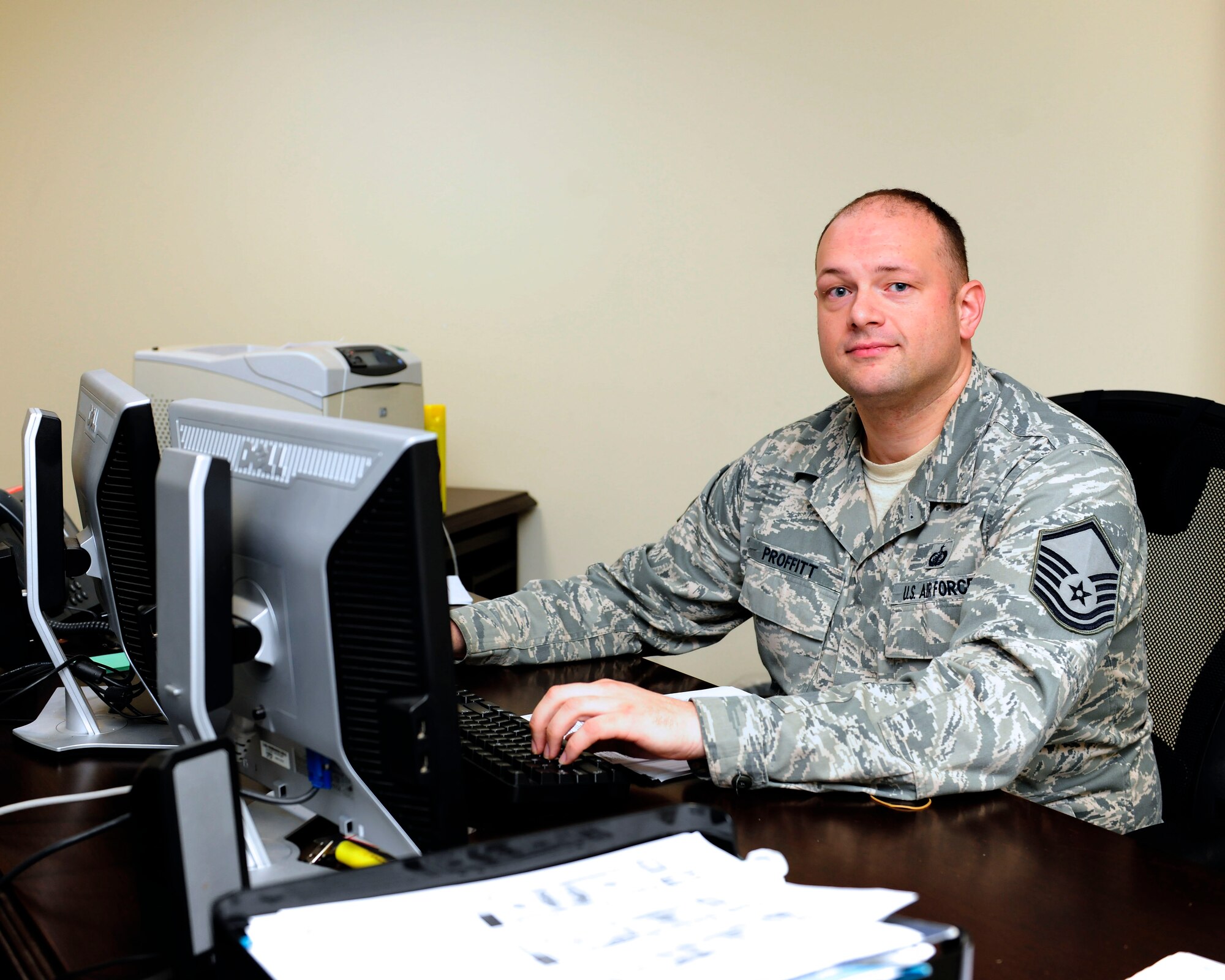 Master Sgt. Gregory Proffitt, 39th Comptroller Squadron flight chief, works at his desk Dec. 16, 2014, Incirlik Air Base, Turkey. Proffitt won the U.S. Air Forces in Europe Financial Management Senior NCO of the Year in the USAFE - Air Forces Africa Financial Management annual awards. (U.S. Air Force photo by Senior Airman Krystal Ardrey/Released) 
