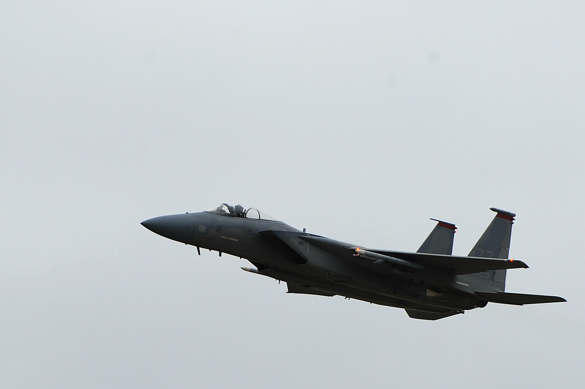 A U.S. Air Force F-15C Eagle from the 67th Fighter Squadron takes off for the third time in one day during a training surge on Kadena Air Base, Japan, Jan. 7, 2015. Surges increase the number of training flights each day during a set time period in order to increase power proficiency and ensure combat readiness. Each focuses on a different aspect of combat readiness and this surge's focus was basic fighter maneuvers. (U.S. Air Force photo by Airman 1st Class Zade C. Vadnais)