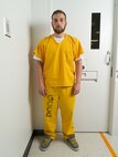 Former Airman 1st Class Lane Wyatt stands in an interview room at Goose Creek Correctional Center Aug. 7, 2014. Wyatt described the months since killing Citari Townes-Sweatt in a June 30, 2013, drunk-driving accident as "my own personal hell." (U.S. Air Force photo/David Bedard)