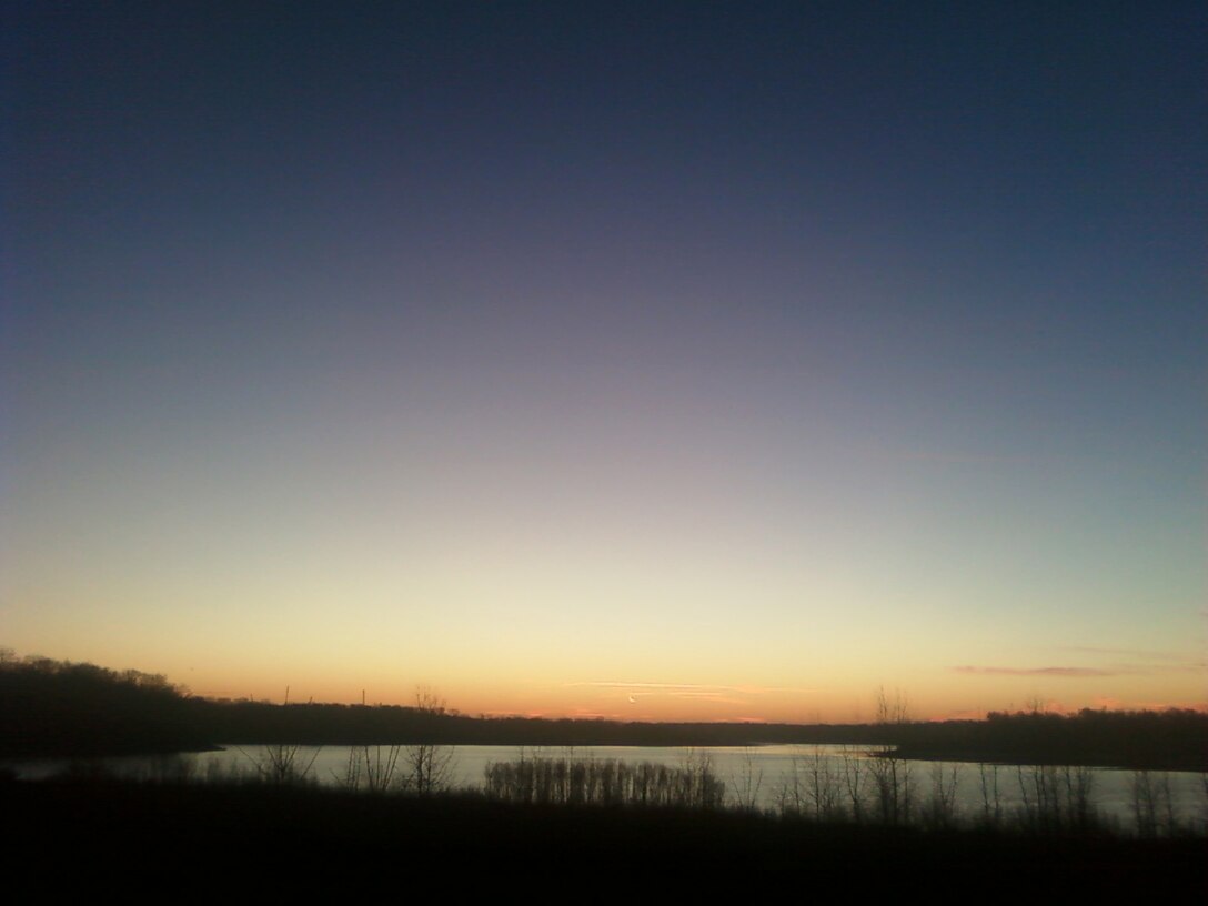 Dawn breaks on a winter morning at Roush Lake, Huntington, Ind.