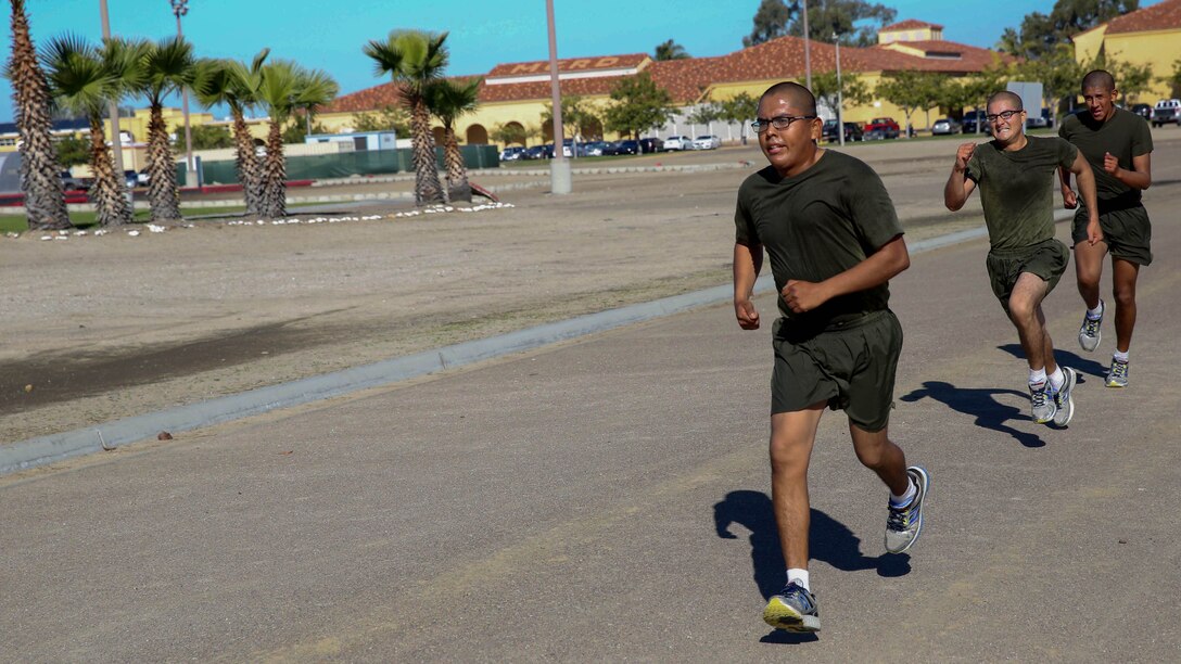 Recruit Florentino A. Buck, Platoon 1050, Charley Company, 1st Recruit Training Battalion, finishes the timed three mile run portion of the Physical Fitness Test at Marine Corps Recruit Depot San Diego, Dec. 22. Buck is Shiprock, N.M., native and was recruited out of Recruiting Substation Albuquerque, N.M. 