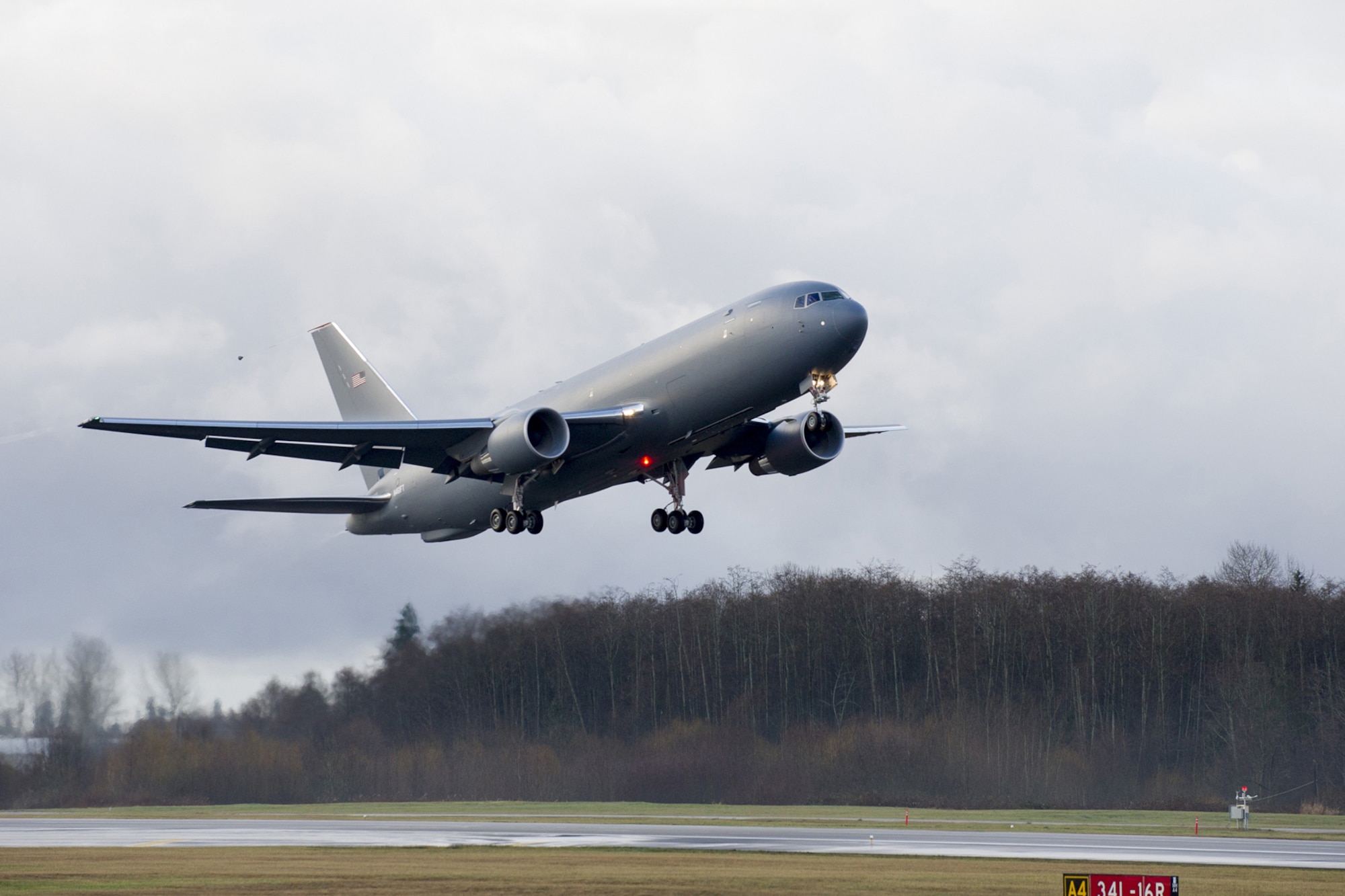 The KC-46A Pegasus development program completed its first flight of Engineering, Manufacturing and Development (EMD) aircraft #1 Dec. 28, 2014. The maiden flight took off from Paine Field in Everett, Washington and landed at Boeing Field, Seattle. (Courtesy photo)
