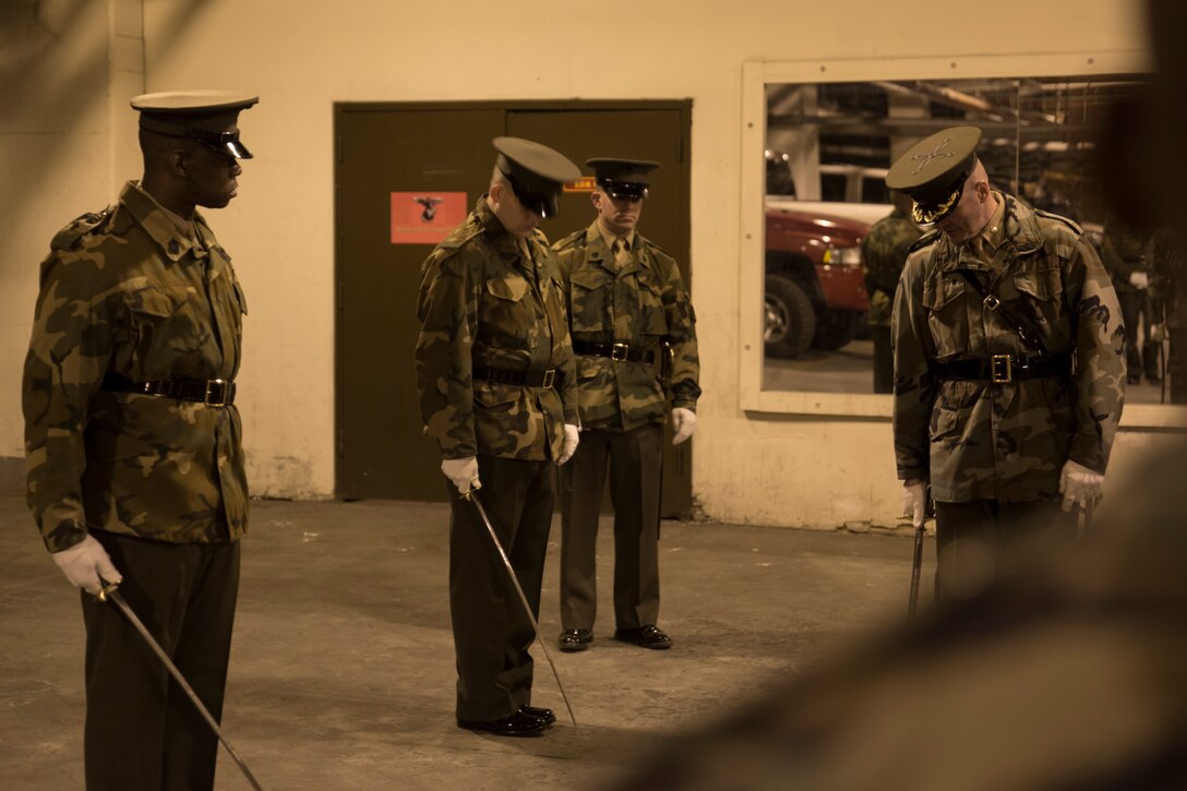 United States Marines practice sword manual during Ceremonial Drill School at Marine Barracks Washington, D.C., Jan. 8, 2015 (U.S. Marine Corps photo by Lance Cpl. Christian J. Varney/Released)