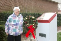 NORFOLK, Va. (Jan. 9, 2015) – Ms. Mary Clark, gold star mother of Pfc. Michael Hopkins, a Medal of Honor recipient, lays a wreath at the  Pfc. Hopkins Memorial  at Camp Allen Jan. 9. Clark traditionally places a wreath on the Hopkins Memorial on his birthday, 22 December, but had to postpone the ceremony this year due to weather.
Pfc. Hopkins is a Posthumous Navy Cross recipient for heroic actions during Operation Macon on 4 July 1966 while assigned to K Co, 3/9, 3rd MARDIV as an automatic rifleman.  He was 21 years old.  His 13 month tour of duty would have been over in August.  Hopkins saved injured LVT crewmen, he made six trips across open ground to resupply his forward position (occupied with three other Marines) with ammunition, aided his Squad Leader who had fallen from wounds, and provided covering fire to a Corpsman seeking to aid his Squad Leader.  As he continued the fight, the Corpsman and Squad Leader were killed by an enemy grenade.  Realizing that the enemy fire was too intense for others to reach his forward position, he deliberately exposed himself in order to divert attention away from his comrades.  Taking the full force of the enemy fire in his own body, he gallantly gave his life for his fellow Marines and his Country.

Hopkins started basic training at Parris Island, SC during February 1963.  He shipped to Vietnam in November 1963 and served with Navy Task Force 77, operating off the coast of Vietnam.  He completed this first thirteen month tour in December 1964.  He joined K Co, 3/9 in Vietnam during July 1965 and was Killed-in-Action twelve months later.  Vietnam War Memorial - Panel 08E, Line 129.
