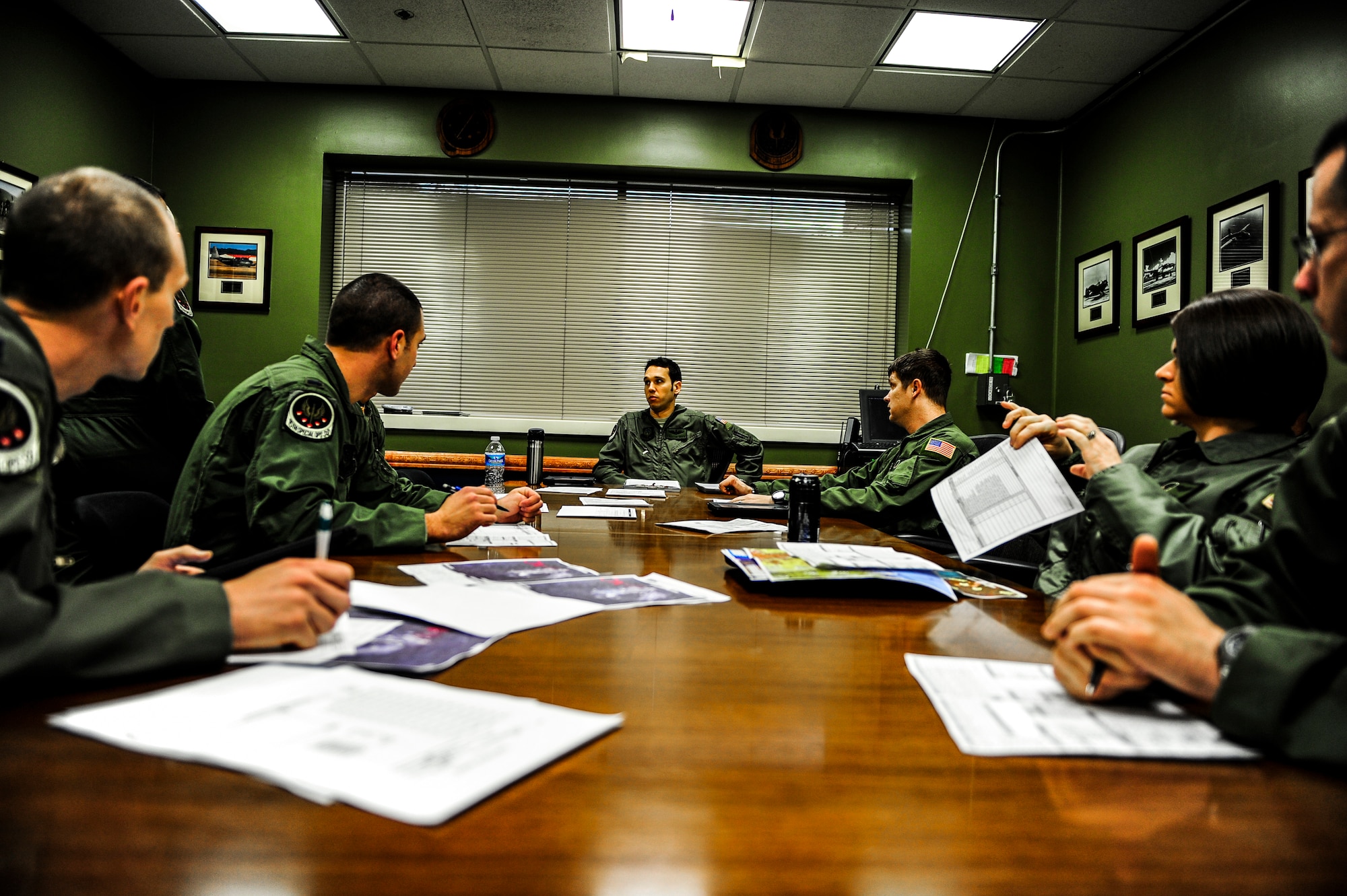 Members from the 15th Special Operations Squadron go over flight plans at Hurlburt Field, Fla., Jan. 7, 2014. The crew planned a high-altitude low-opening jump for members from the 24th Special Operations Wing. (U.S. Air Force photo/Senior Airman Christopher Callaway) 