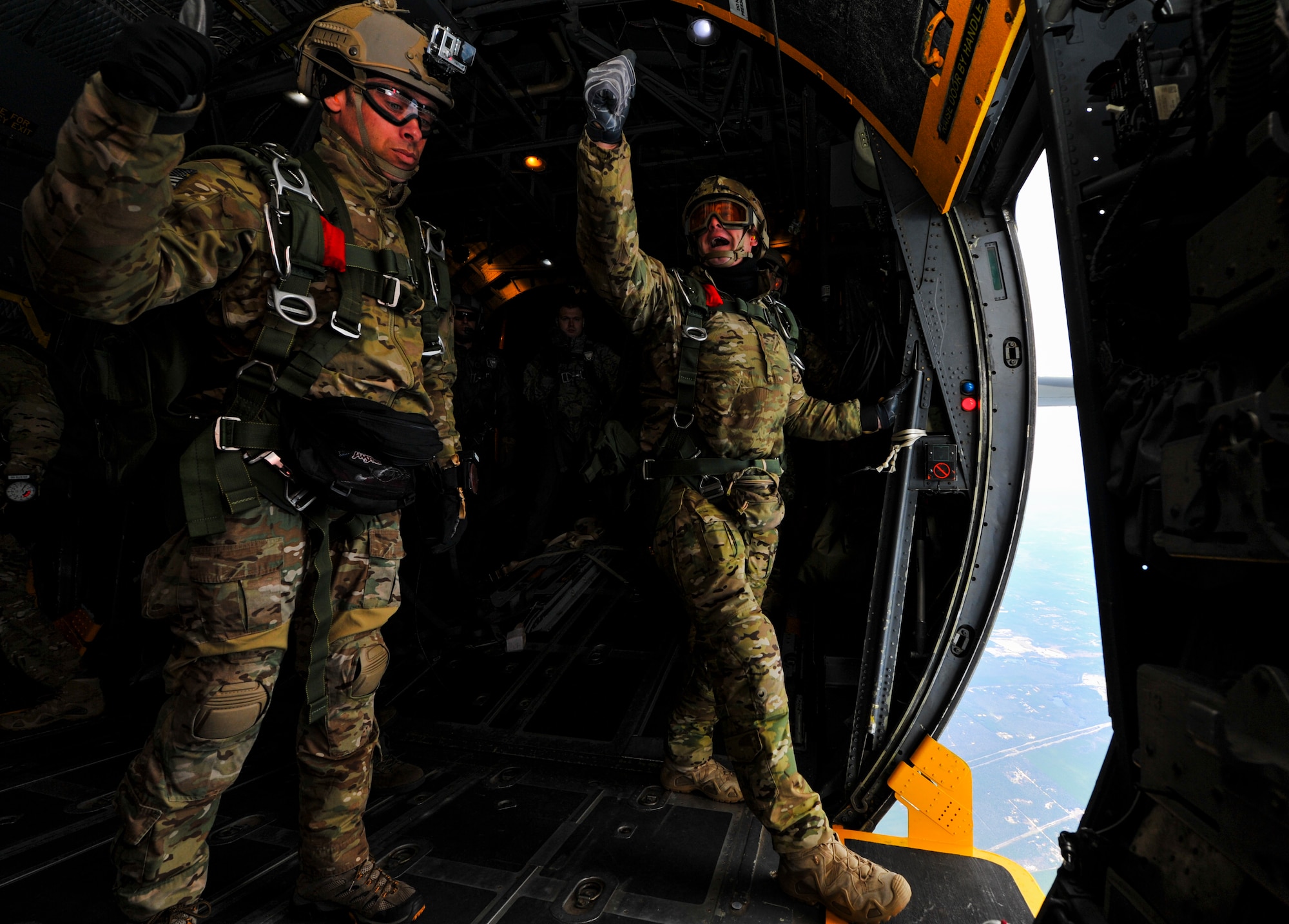 Special Tactics Airmen from the 24th Special Operations Wing prepare to jump out of an MC-130H Talon II at Hurlburt Field, Fla., Jan. 7, 2014. A group of 16 members teamed up with a MC-130H Talon II crew to jump from 10,000 feet to train for alternate insertion into hostile or austere environments. (U.S. Air Force photo/Senior Airman Christopher Callaway)