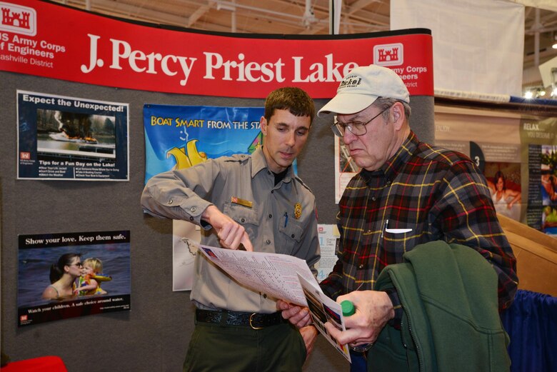 U.S. Army Corps of Engineers Nashville District Park Ranger Noel Smith from J. Percy Priest Lake shows Steve Enfinger from Columbia, Tenn., a map of the J. Percy Priest lake at the 29th Nashville Boat & Sportshow on Thursday, Jan. 8, 2015 in Music City Center.   Boating enthusiasts attending the Boat & Sportshow are encouraged to navigate to the Corps of Engineers booth to get important information about local lakes before embarking on the water this recreation season. 
