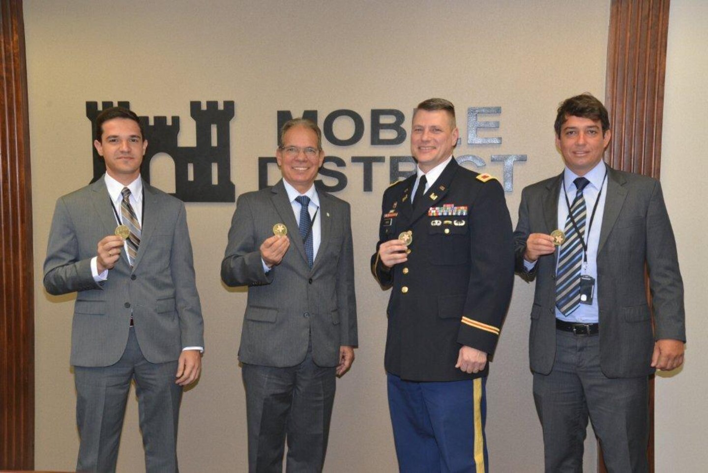 Mobile district Commander Col. Jon Chytka presented each of the Brazilian nationals from CODEVASF with the Commander's coin.