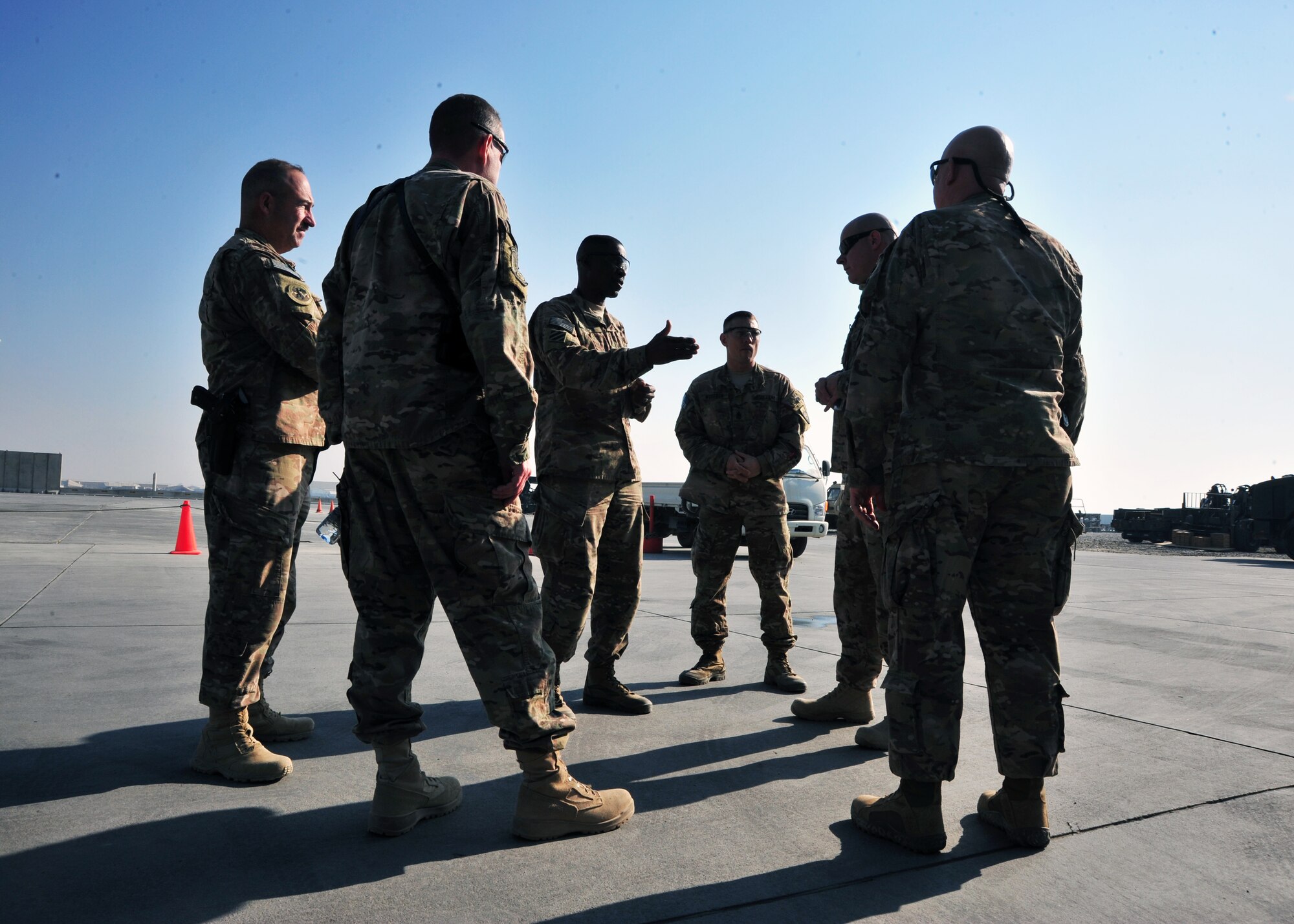 U.S. Army Command Sgt. Maj. Christopher Gilpin, Combined Joint Task Force 3 United States Forces Afghanistan, talks with some of the 455th Air Expeditionary Wing’s highest enlisted leaders during a tour Jan. 6, 2015 at Bagram Airfield, Afghanistan. During the tour, Gilpin had the opportunity to meet with 455th Air Expeditionary Wing leadership and become better acquainted with Air Force assets and squadrons. (U.S. Air Force photo by Staff Sgt. Whitney Amstutz/released)