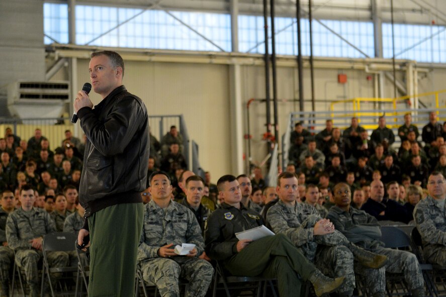 Lt. Col. Dan DeYoung (left), 62nd Airlift Wing Safety chief, speaks to Airmen and personnel about renewing their commitment to safety during Safety Down Day Jan. 8, 2015, at Joint Base Lewis-McChord, Wash. The theme of the day, “Back to Basics,” challenged Airmen to look at their day-to-day safety procedures and techniques. (U.S. Air Force photo/Senior Airman Rebecca Blossom)