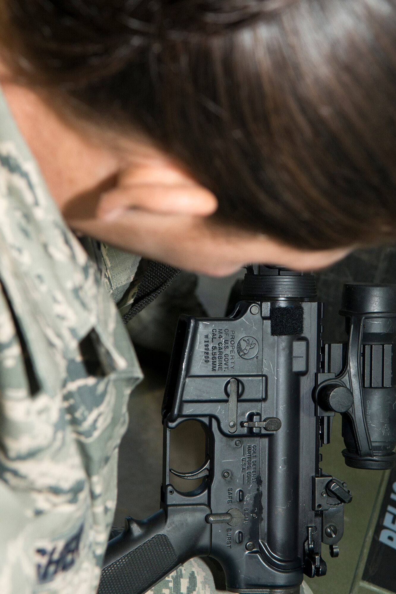 U.S. Air Force Tech. Sgt. Starlight Lesher, 307th Security Forces Squadron, reads the serial number of an M4 rifle during an inventory inspection on Jan. 6, 2015, 2015. The inspection was in preparation for a mobility exercise the 307th Bomb Wing will undergo during the January Unit Training Assembly. (U.S. Air Force photo by Master Sgt. Greg Steele/Released)
