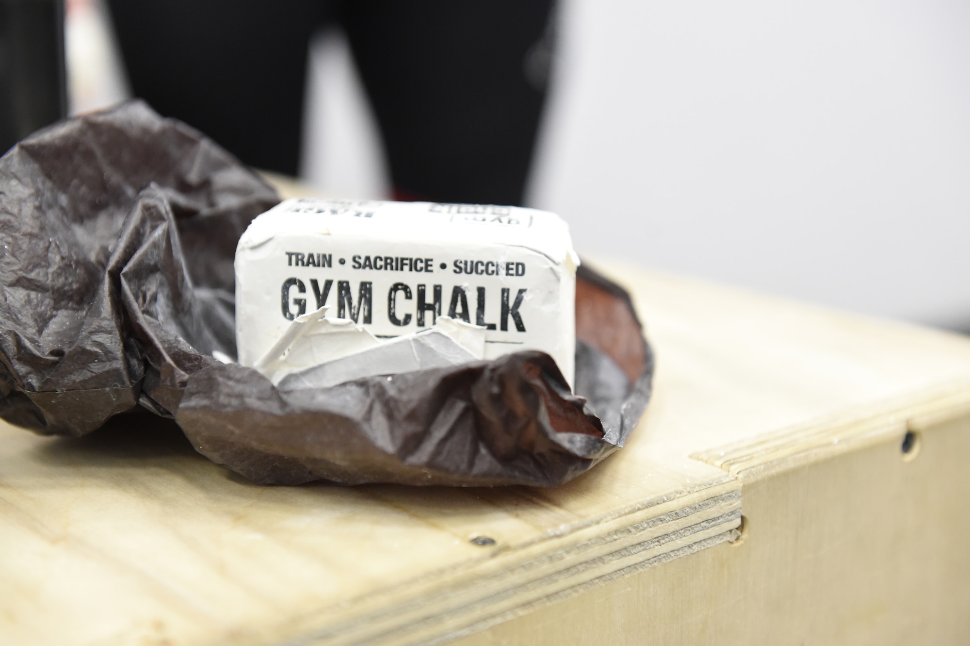 Powdered gym chalk is used to ensure a strong grip to prevent slipping when using exercise equipment Jan. 5, 2015, in the Panther Pit room in the fitness room on Buckley Air Force Base, Colo. The Panther Pit, located next to the racquetball courts, provides a place where service members, civilians, retirees and their families can use a variety of new equipment to enhance their functional fitness. (U.S. Air Force photo by Airman 1st Class Samantha Saulsbury/Released)