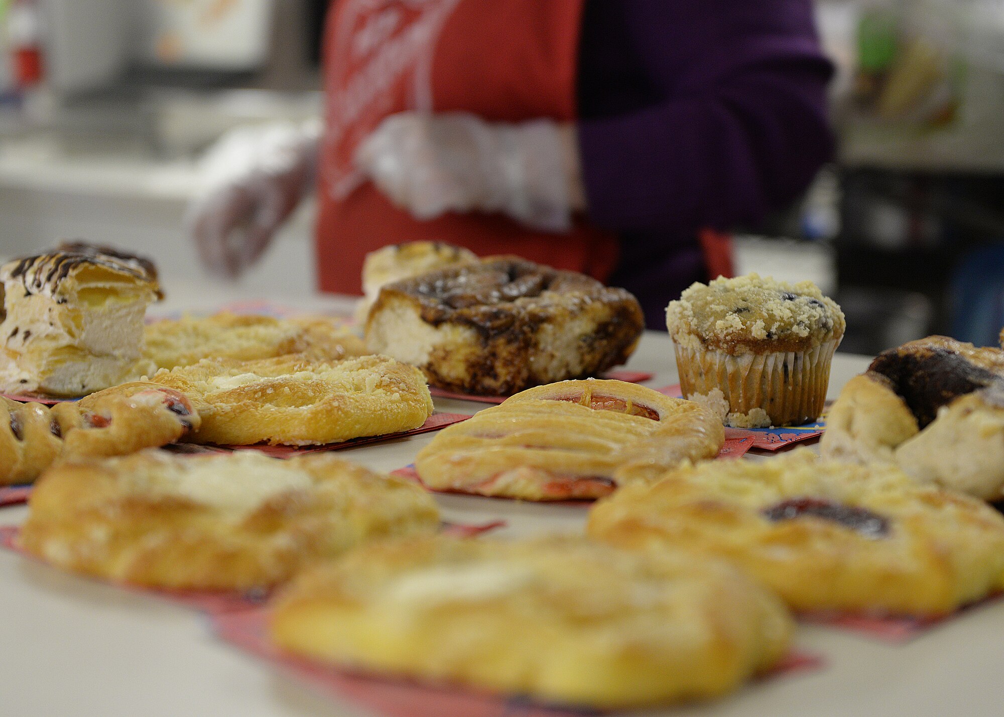 ALTUS AIR FORCE BASE, Okla. – Altus AFB Airmen prepare food at the Salvation Army Soup Kitchen, Jan. 8, 2015. Over the course of four hours, six Altus AFB members helped serve food to more than 50 individuals in need. (U.S. Air Force photo by Senior Airman Levin Boland/Released)