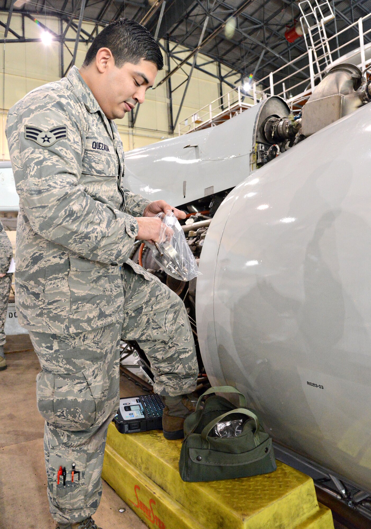 Senior Airman William Quezada, with the 552nd Environmental and Electrical Shop, uses a pre-made kit for a heat exchanger on an E-3 AWACS. The 552nd Maintenance Squadron’s recent rapid improvement event established that if the shop can order and replenish the kits immediately after an ISO is complete, it would save time on the next ISO by not having to wait to order them since they would already have them on-hand. (Air Force photo by Kelly White)