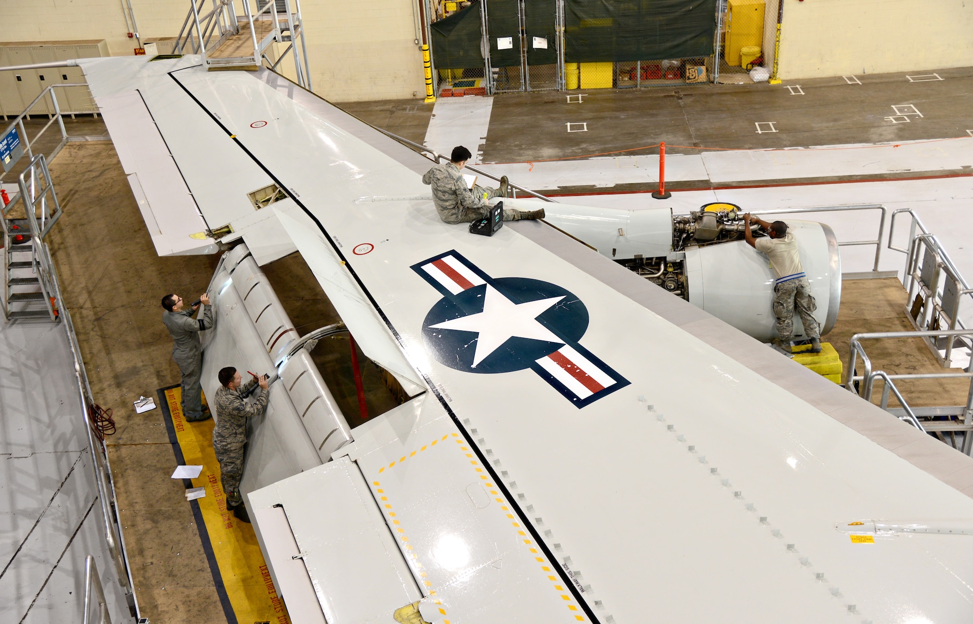 During an Isochronal Inspection, or ISO, maintainers from different shops work together to make sure necessary repairs and routine maintenance are done correctly and efficiently to keep the jets flying. (Air Force photo by Kelly White)