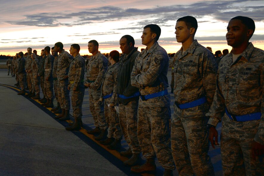Airmen line up on the flightline to start the foreign object debris walk Jan. 5, 2015, at Moody Air Force Base, Ga. A majority of Team Moody members participated in the FOD walk. (U.S. Air Force photo by Airman 1st Class Kathleen D. Bryant/Released)