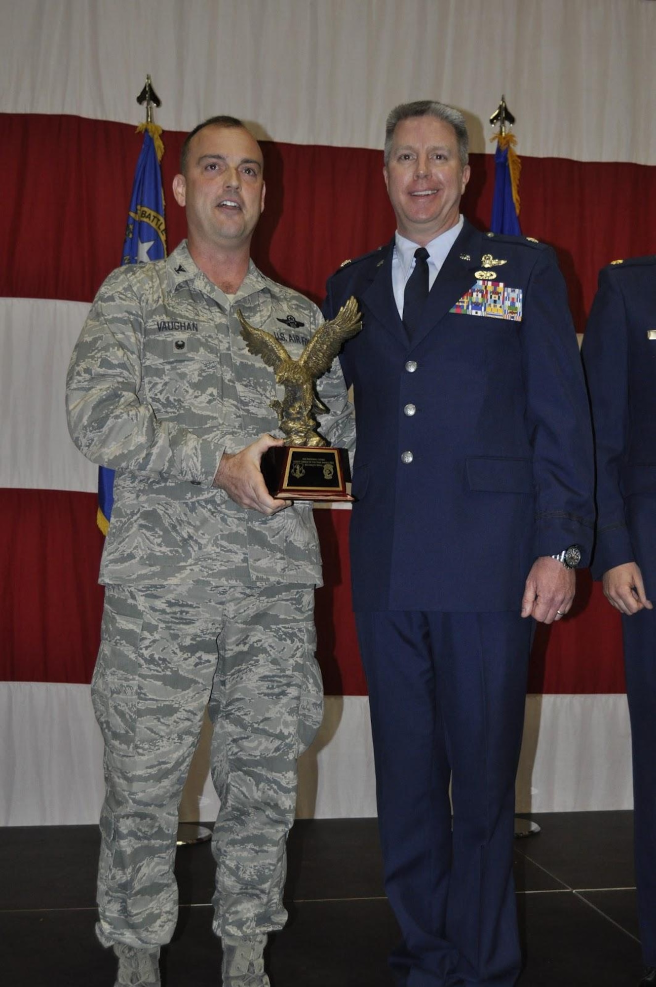 ANG Director of Safety Col. Edward Vaughan honors Chief of Safety Lt. Col. Anthony Macabee with the 2013 ANG Office of the Year award.