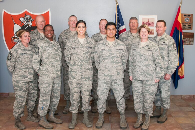 Chief’s Council scholarship recipients Airman 1st Class Israel Romero and Airman 1st Class Jacqueline Ochoa receive $500 scholarships here on January 5. (U.S. Air National Guard Photo by 2nd Lt. Lacey Roberts/Released)