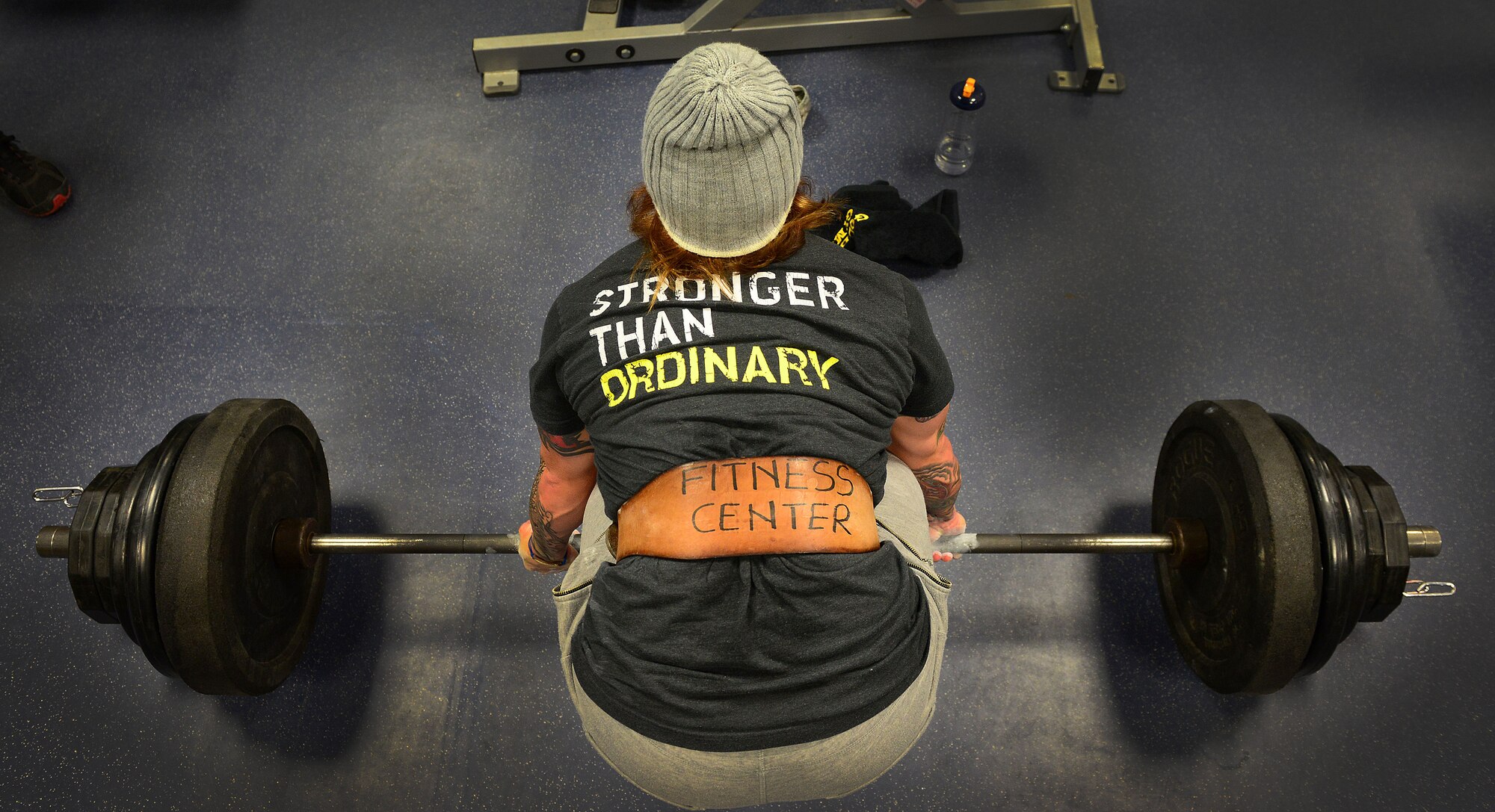 Staff Sgt. Ashley Bryant, 31st Fighter Wing Command Post emergency action controller, performs a deadlift, Jan. 6, 2014, at Aviano Air Base, Italy. While home on leave over the holidays, Bryant broke the women’s national record for bench press and returned to Aviano to break the Dragon Fitness Center’s ‘Wall of Fame’ record, with a total weight of 235 pounds. (U.S. Air Force photo/Senior Airman Matthew Lotz)
