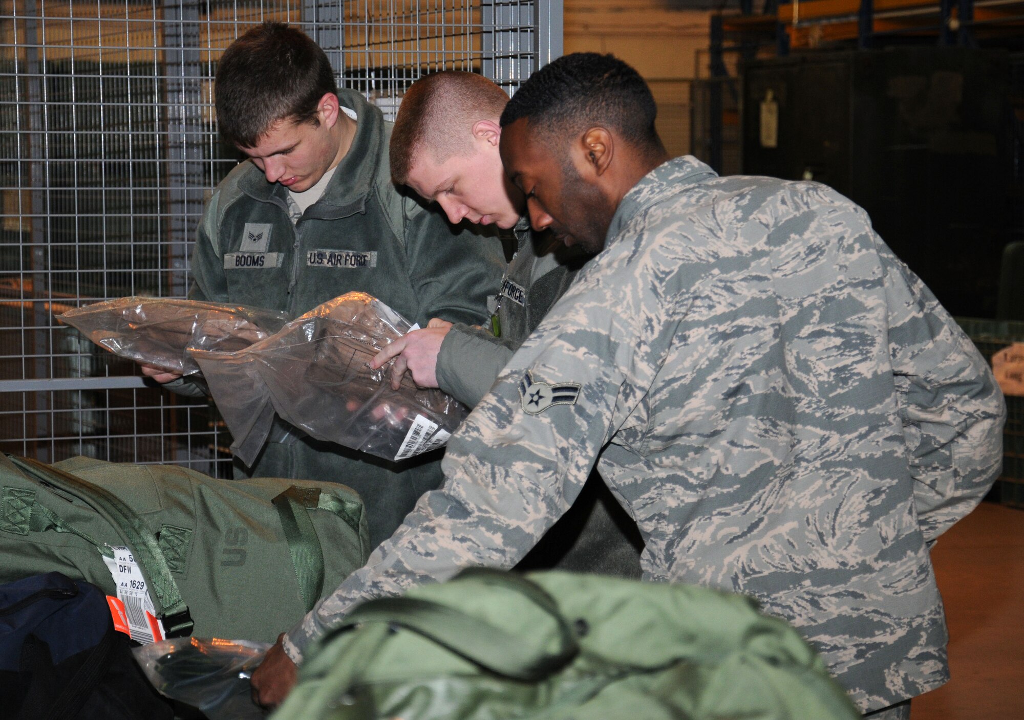 Team Mildenhall members take part in an operational readiness exercise Jan. 7, 2015, on RAF Mildenhall, England. The Airmen took part in an Ability To Survive and Operate exercise to ensure they’re mission ready in the event of deployment. (U.S. Air Force photo by Gina Randall/Released)