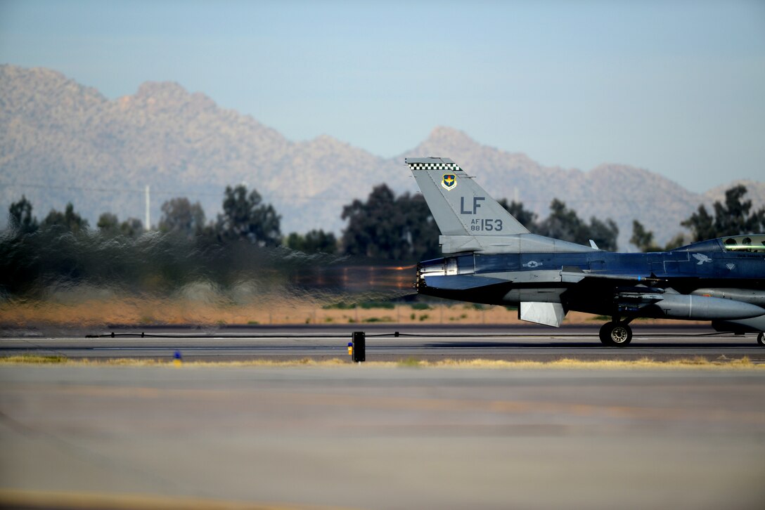 An F-16 Fighting Falcon prepares to take off January 8 on the runway at Luke Air Force Base. (U.S. Air Force photo by Staff Sgt. Timothy Boyer)