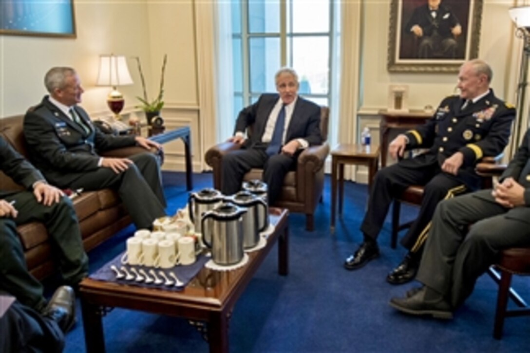 U.S. Defense Secretary Chuck Hagel, center, and U.S. Army Gen. Martin Dempsey, right, chairman of the Joint Chiefs of Staff, meet with Lt. Gen. Benjamin "Benny" Gantz, chief of the Israeli defense staff, at the Pentagon, Jan. 8, 2015. Leaders discussed bilateral cooperation, regional security and other matters of mutual concern.